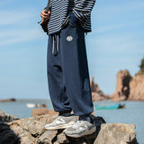 XHP 10#JA2128     英文字logo衛褲束腳褲