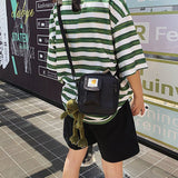 DP#  簡約小橙色logo 小斜背包